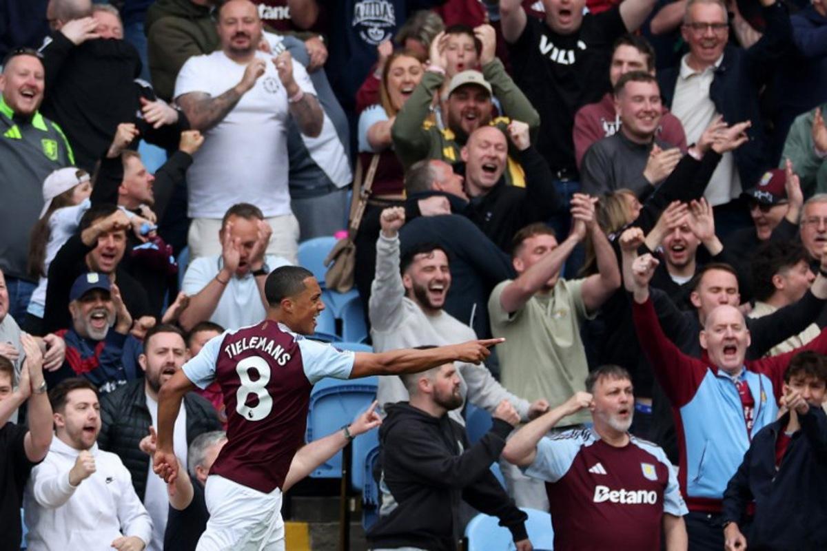 Aston Villa's Belgian midfielder #08 Youri Tielemans celebrates after scoring the opening goal during the English Premier League football match between Aston Villa and Fulham at Villa Park in Birmingham, central England on May 3, 2025. Adrian Dennis / AFP