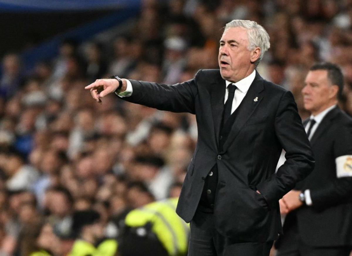 Real Madrid's Italian coach Carlo Ancelotti gestures on the touchline during the Spanish Copa del Rey (King's Cup) semi-final second leg football match between Real Madrid CF and Real Sociedad at the Santiago Bernabeu stadium in Madrid on April 1, 2025. JAVIER SORIANO / AFP