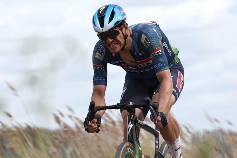 Soudal Quick-Step's Belgian rider Jasper Stuyven cycles on a cobblestone sector during the 123rd edition of the Paris-Roubaix one-day classic cycling race, 258.3 km between Compiègne and Roubaix, northern France, on April 12, 2026. Anne-Christine POUJOULAT / AFP