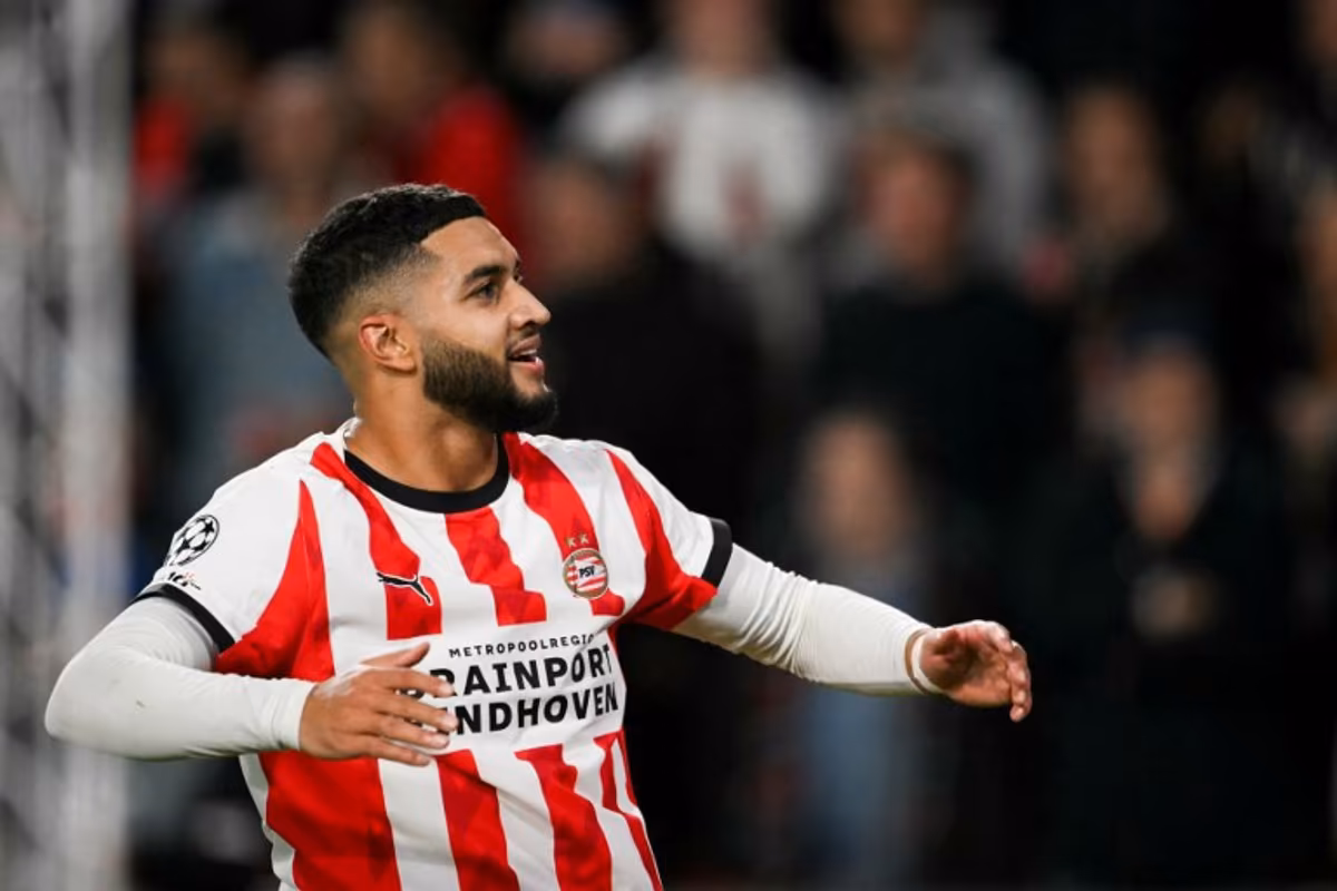 PSV Eindhoven's Moroccan midfielder #34 Ismael Saibari celebrates after scoring his team second goal during the UEFA Champions League, league phase football match between PSV Eindhoven and Napoli at the Philips Stadium, in Eindhoven, on October 21, 2025. NICOLAS TUCAT / AFP