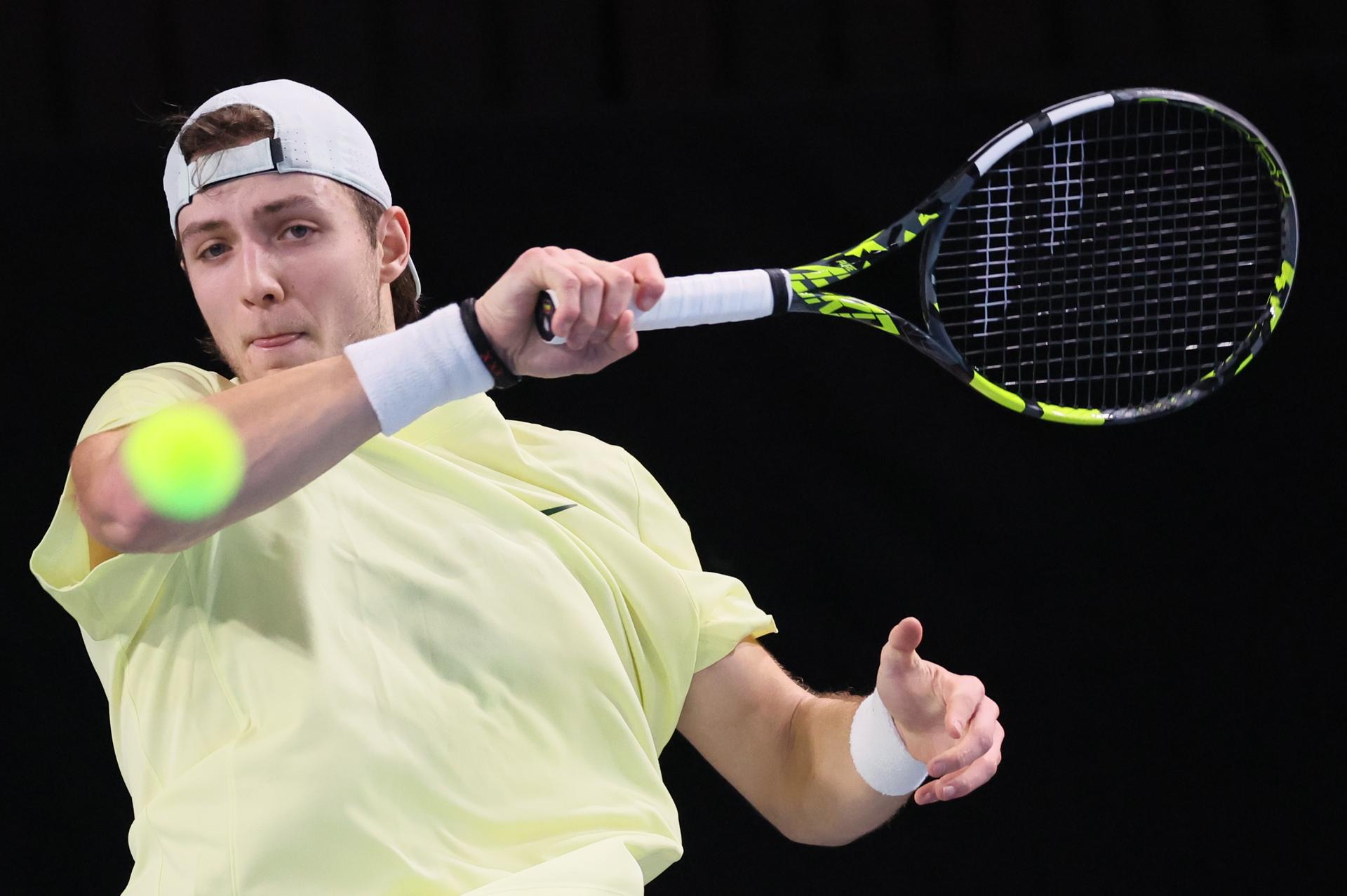 Belgian Tibo Colson pictured in action during a tennis match against German Squire, a qualification match for the men's singles at the BW Open ATP Challenger 125 tournament, in Louvain-la-Neuve, Monday 22 January 2024. THE BW Open takes place from 22 to 28 January. BELGA PHOTO BENOIT DOPPAGNE