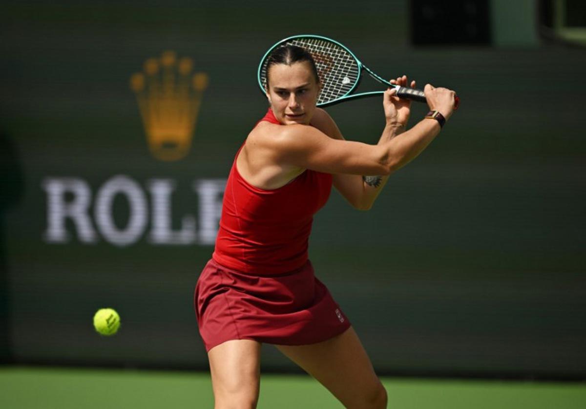 Belarus' Aryna Sabalenka returns the ball to Russia's Mirra Andreeva during the women's singles final tennis match at the BNP Paribas Open at the Indian Wells Tennis Garden in Indian Wells, California, on March 16, 2025. Patrick T. Fallon / AFP