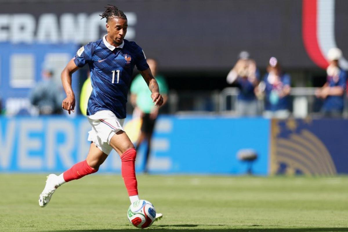 France's forward #11 Michael Olise controls the ball during the 2026 World Cup Group I football match between France and Senegal at the New York/New Jersey Stadium in East Rutherford on June 16, 2026. CHARLY TRIBALLEAU / AFP