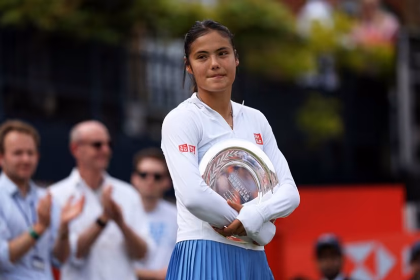 Britain's Emma Raducanu stands with the runners up trophy following her loss to Croatia's Donna Vekic after their women's singles final tennis match at the HSBC WTA Championships at Queen's Club in west London on June 14, 2026. Adrian Dennis / AFP