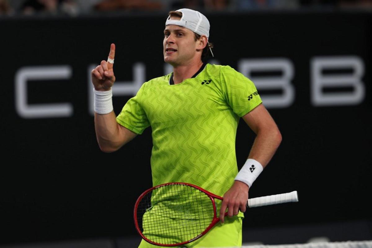 Belgium's Zizou Bergs reacts after a point against Poland's Hubert Hurkacz during their men's singles match on day three of the Australian Open tennis tournament in Melbourne on January 20, 2026. IZHAR KHAN / AFP