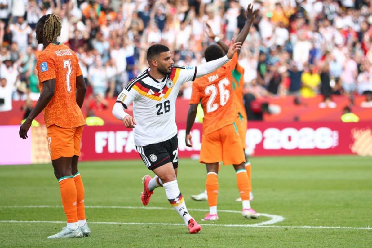 Germany's forward #26 Deniz Undav celebrates after scoring his team's second goal during the 2026 World Cup Group E football match between Germany and Ivory Coast at the Toronto Stadium in Toronto on June 20, 2026. Cole Burston / AFP