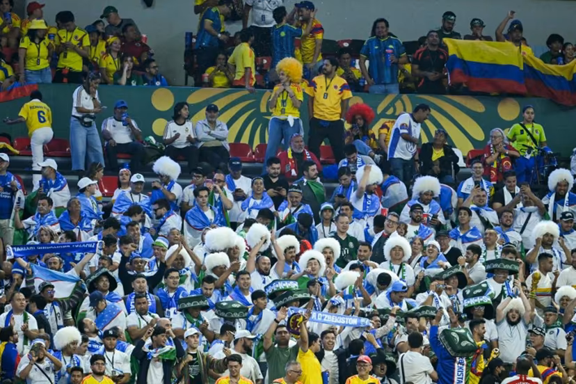 Uzbek fans cheer for their team during the 2026 World Cup Group K football match between Uzbekistan and Colombia at the Mexico City Stadium in Mexico City on June 17, 2026. Yuri CORTEZ / AFP