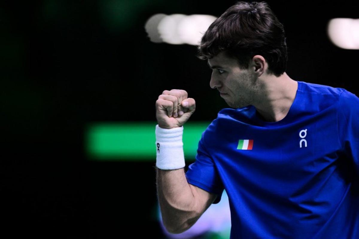 Italy's Flavio Cobolli reacts against Austria's Filip Misolic during their Davis Cup men's singles quarter finals tennis match, at the Super Tennis Arena, in Bologna, northen Italy, on November 19, 2025. Tiziana FABI / AFP