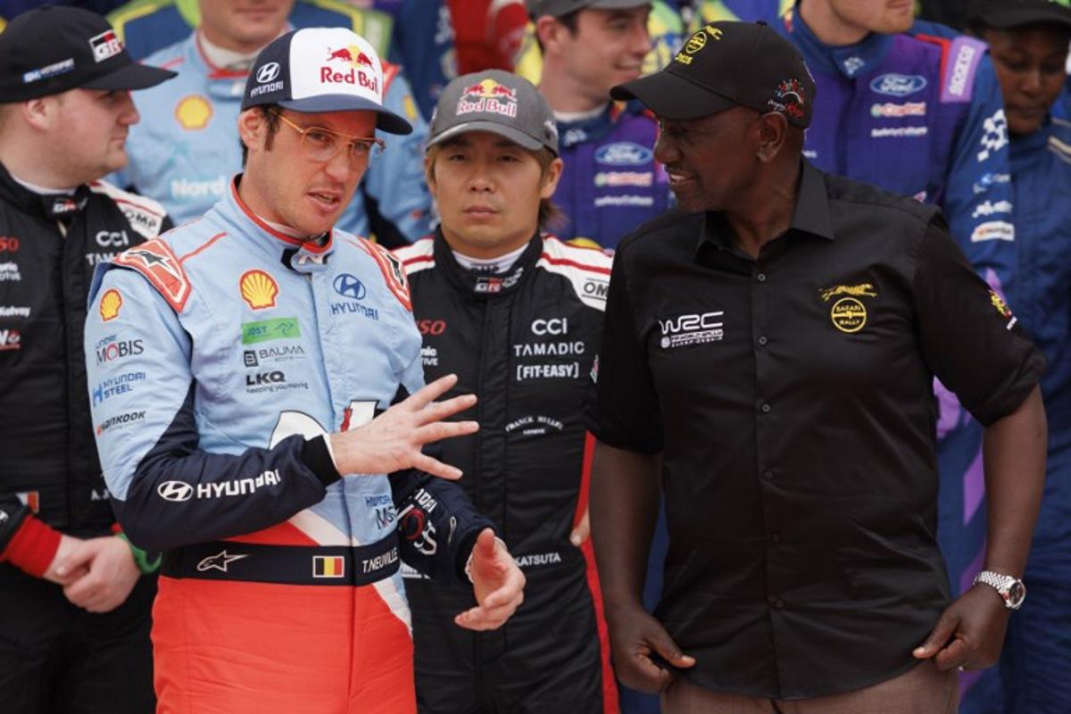 Belgian rally driver Thierry Neuville (2nd-L), Japanese rally driver Takamoto Katsuta and Kenya's President William Ruto (R) talk before the flagging-off for the World Rally Championship (WRC) Safari Rally Kenya in Nairobi on March 20, 2025. SIMON MAINA / AFP