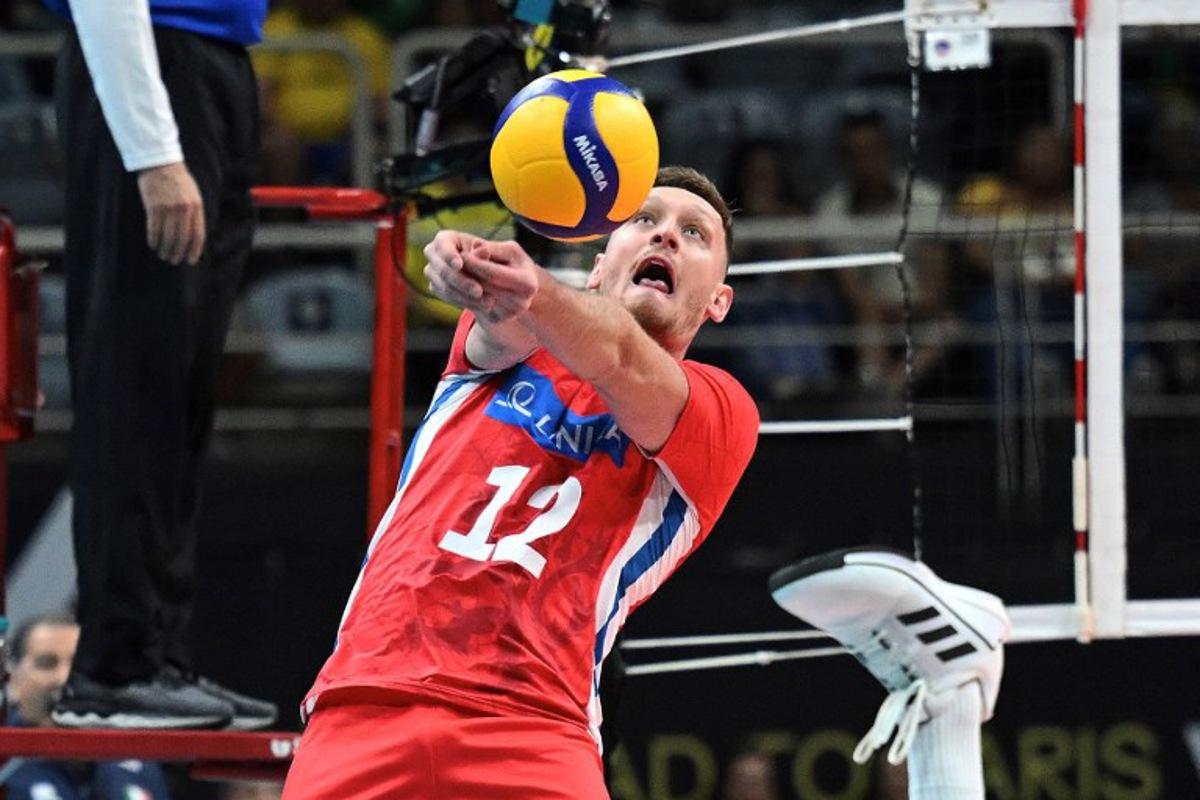 Czech Republic's Martin Licek returns the ball during the Pool A Volleyball Olympic Qualifier match against Italy in Rio de Janeiro, Brazil, on September 30, 2023. CARL DE SOUZA / AFP
