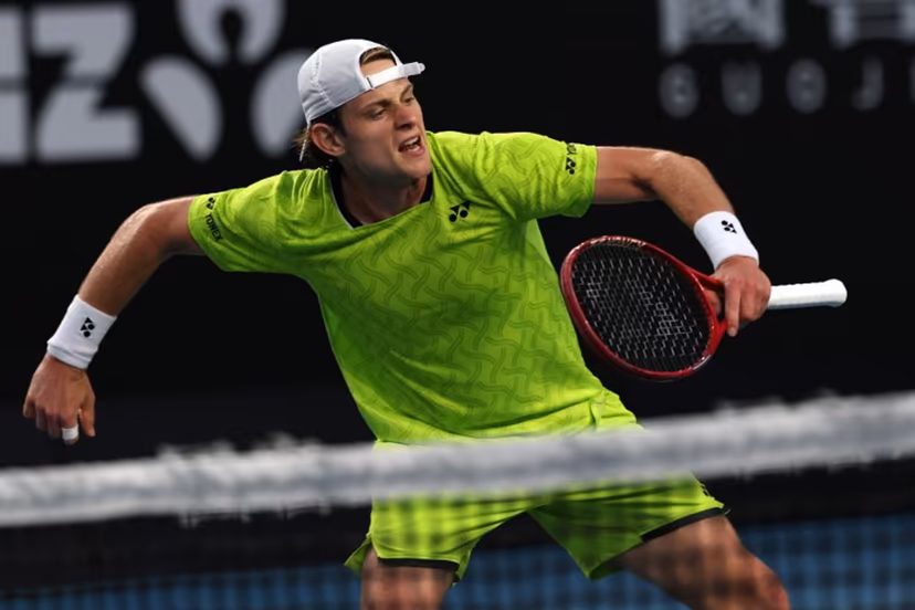 Belgium's Zizou Bergs reacts after a point against Poland's Hubert Hurkacz during their men's singles match on day three of the Australian Open tennis tournament in Melbourne on January 20, 2026. IZHAR KHAN / AFP