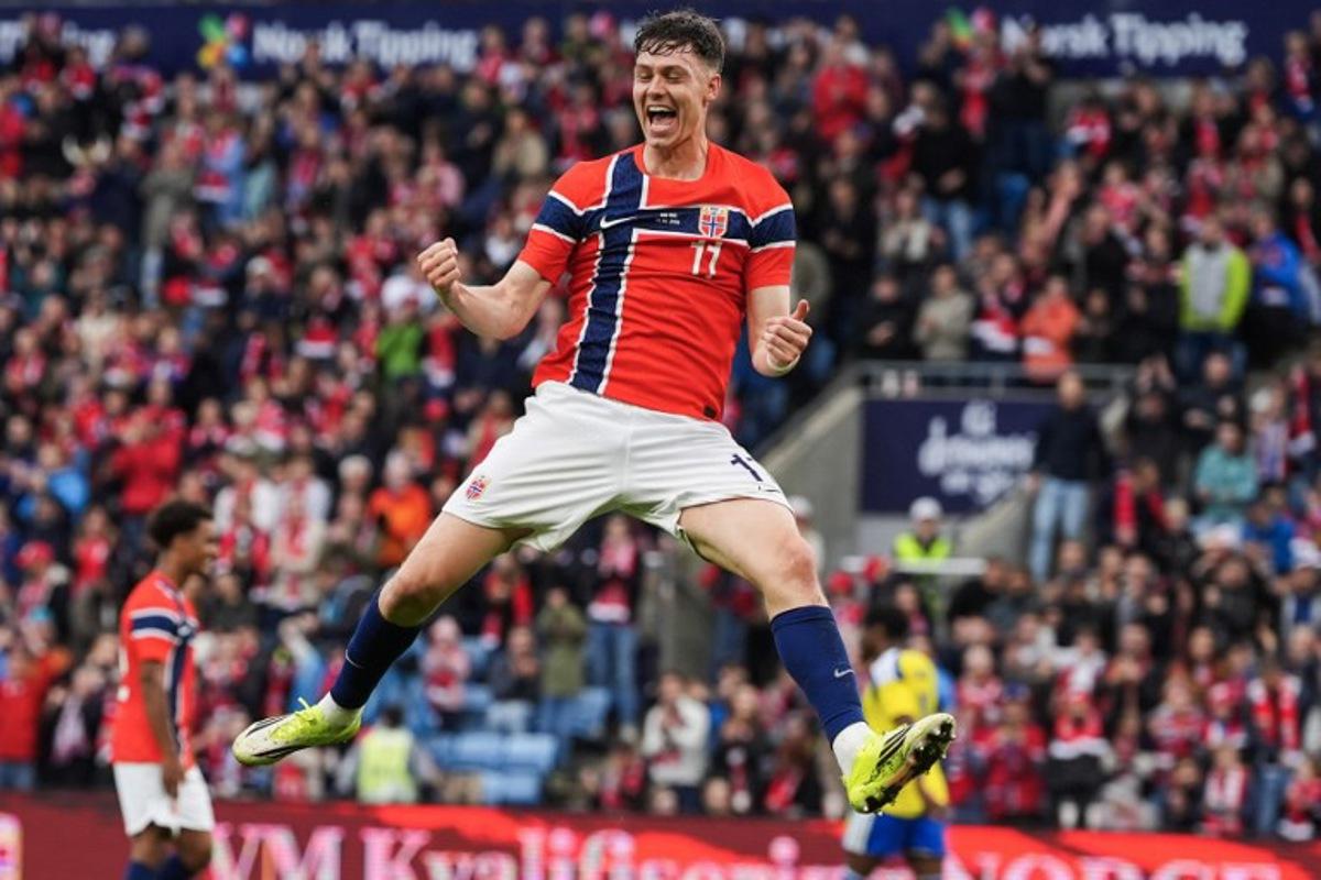 Norway's forward #11 Jorgen Strand Larsen celebrates scoring the 3-0 goal with his teammates during the friendly match between Norway and Sweden at Ullevaal Stadium, on June 1, 2026 ahead of the 2026 FIFA World Cup football tournament. Lise Åserud / NTB / AFP
