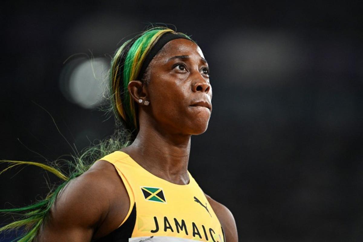 Jamaica's Shelly-Ann Fraser-Pryce reacts during the women's 100m semi-final during the World Athletics Championships in Tokyo on September 14, 2025. Jewel SAMAD / AFP
