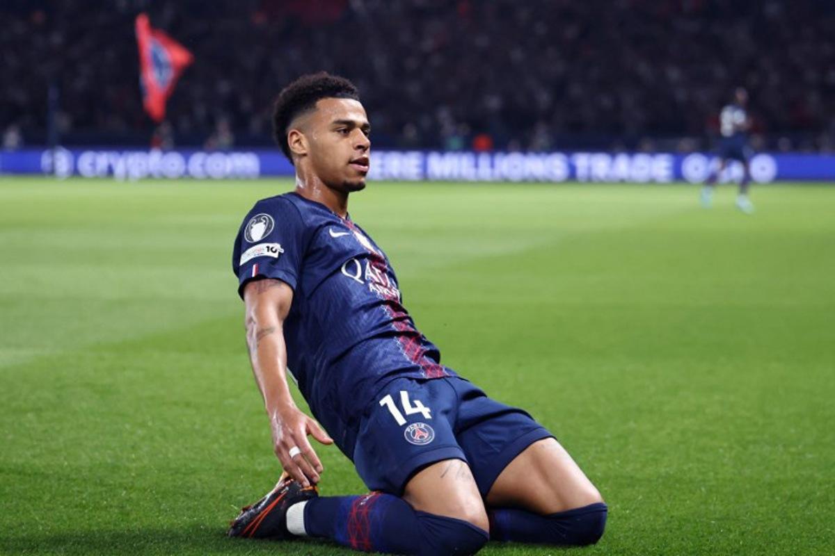 Paris Saint-Germain's French midfielder #14 Desire Doue celebrates after scoring the opening goal during the UEFA Champions League quarter-final first leg football match between Paris Saint-Germain (PSG) and Liverpool FC at the Parc des Princes stadium in Paris on April 8, 2026. FRANCK FIFE / AFP
