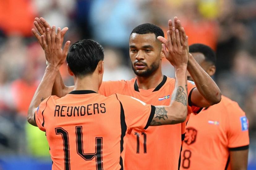 Netherlands' forward #11 Cody Gakpo celebrates scoring this team's fourth goal during the 2026 World Cup Group F football match between the Netherlands and Sweden at the Houston Stadium in Houston on June 20, 2026. RONALDO SCHEMIDT / AFP