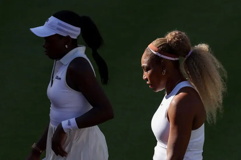 US player Serena Williams (R) walks with Canada's Victoria Mboko (L) while playing against US player Nicole Melichar-Martinez and New Zealand's Erin Routliffe during their round of 16, doubles match at the HSBC WTA tennis Championships at Queen's Club in west London on June 9, 2026. Adrian Dennis / AFP