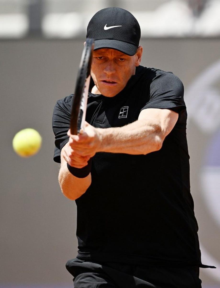 Italy's Jannik Sinner hits a return to Russia's Andrey Rublev during the ATP Rome Open tennis tournament at Foro Italico in Rome on May 14, 2026. Tiziana FABI / AFP