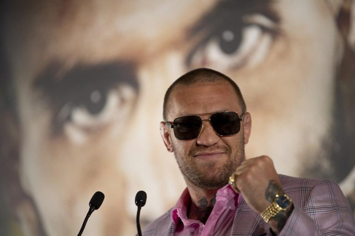 Irish MMA fighter Conor McGregor smiles during the presentation of the Bare Knuckle Fighting Championship (BKFC) in Marbella on July 18, 2024, ahead of the fight between Tenaglia and Soto set to October 12, 2024. JORGE GUERRERO / AFP