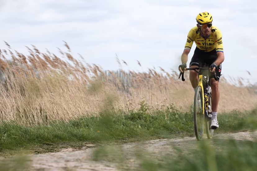 Team Visma - Lease a Bike's French rider Christophe Laporte cycles on a cobblestone sector during the 123rd edition of the Paris-Roubaix one-day classic cycling race, 258.3 km between Compiègne and Roubaix, northern France, on April 12, 2026. Anne-Christine POUJOULAT / AFP
