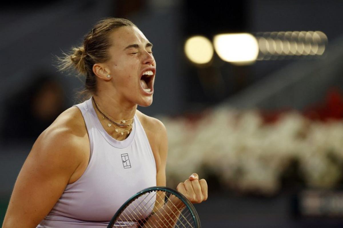Belarus' Aryna Sabalenka reacts to wining a point against Ukraine's Marta Kostyuk during their 2025 WTA Tour Madrid Open tennis tournament singles match at the Caja Magica in Madrid, on April 30, 2025. OSCAR DEL POZO / AFP