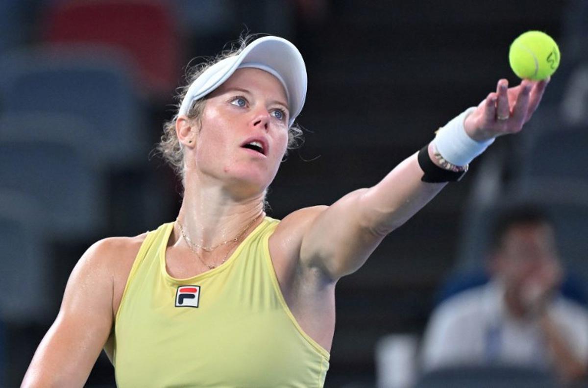 Germany's Laura Siegemund serves to Russia's Mirra Andreeva during their women's singles match at the Wuhan Open tennis tournament in Wuhan, Central China's Hubei province on October 7, 2025. Adek BERRY / AFP