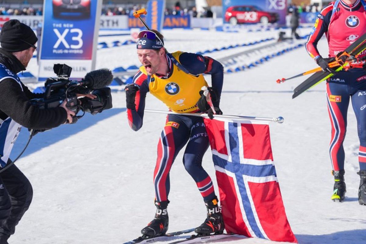 Winner Norway's Sturla Holm Laegreid celebrates after the men's 12.5 km pursuit of the IBU Biathlon World Cup in Holmenkollen, near Oslo, Norway, on March 22, 2025. Terje Pedersen / NTB / AFP