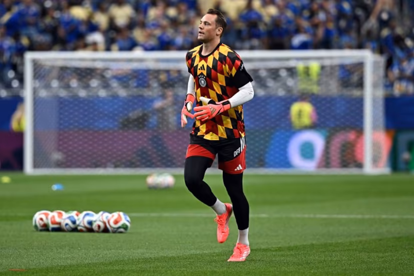 Germany's goalkeeper #01 Manuel Neuer takes part in the warm-up ahead of the 2026 World Cup Group E football match between Germany and Curacao at the Houston Stadium in Houston on June 14, 2026. Paul ELLIS / AFP