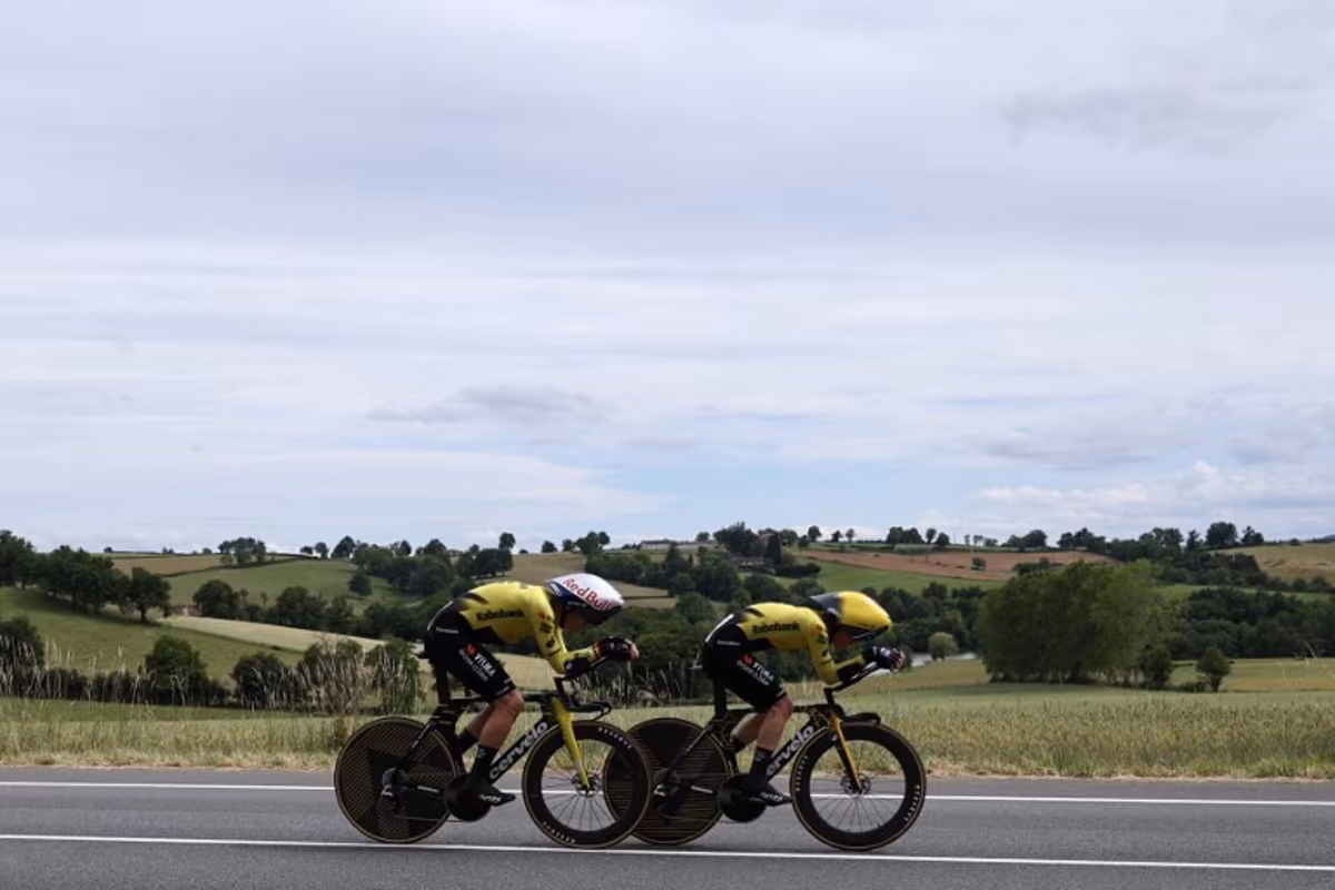 Team Visma | Lease a Bike's Belgian rider Wout Van Aert (L) cycles during the 3rd stage of the Tour Auvergne-Rhone-Alpes cycling race (formerly known as the Criterium du Dauphine), 28,4km team time trial departing and arriving in Perreux central France, on June 9, 2026. Anne-Christine POUJOULAT / AFP