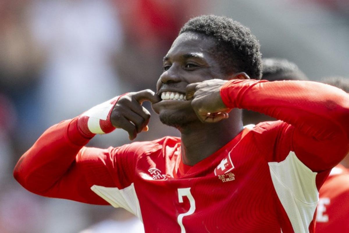 Switzerland's forward #7 Breel Embolo celebrates scoring his team's first goal during a friendly football match between Switzerland and Jordan ahead of the 2026 FIFA World Cup football tournament at the Kybunpark stadium in St. Gallen on May 31, 2026. Ennio LEANZA / AFP