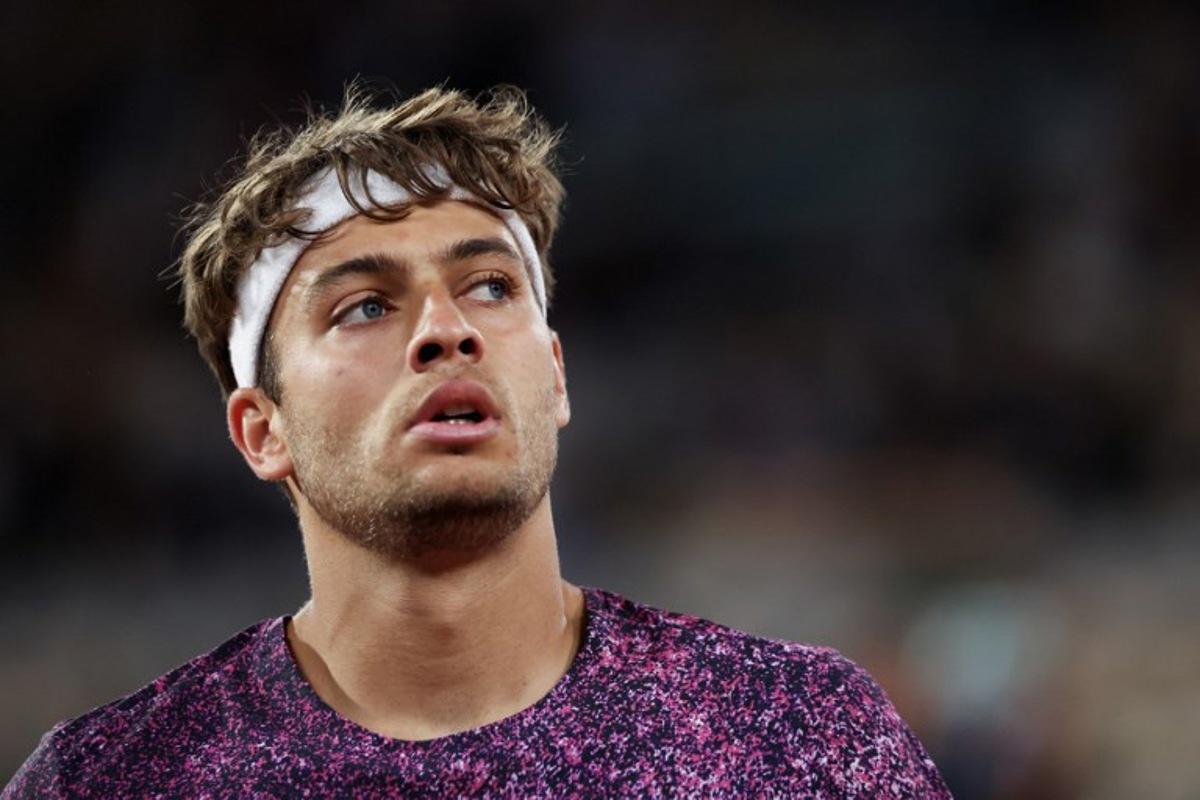 Italy's Flavio Cobolli looks on as he plays against Canada's Felix Auger-Aliassime during their men's quarter final singles match on day 11 of the French Open tennis tournament on Court Philippe-Chatrier at the Roland-Garros Complex in Paris on June 3, 2026. ALAIN JOCARD / AFP