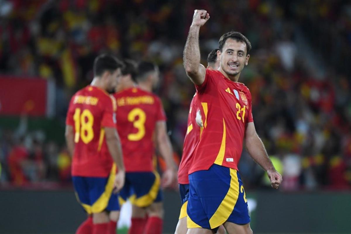 Spain's forward #21 Mikel Oyarzabal celebrates scoring his team's second goal during the 2026 World Cup qualifier Europe zone group E football match between Spain and Georgia at Manuel Martinez Valero stadium in Elche on October 11, 2025. Jose Jordan / AFP