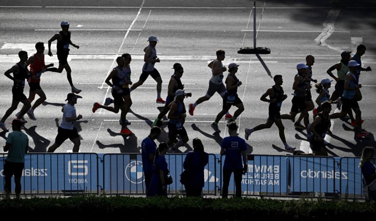 Runners take part in the 51st edition of the Berlin Marathon in Berlin, Germany on September 21, 2025. Tobias SCHWARZ / AFP