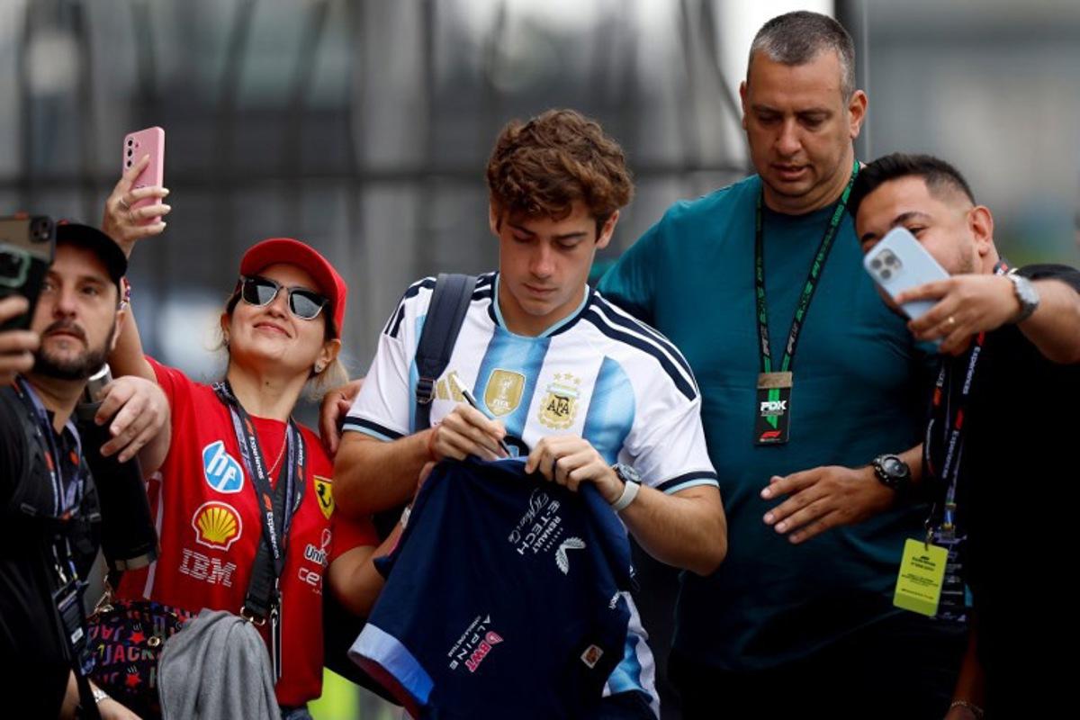 Alpine's Argentinian driver Franco Colapinto arrives at the practice session of the Sao Paulo Formula One Grand Prix at the Jose Carlos Pace racetrack, aka Interlagos, in Sao Paulo, Brazil on November 7, 2025. Miguel SCHINCARIOL / AFP