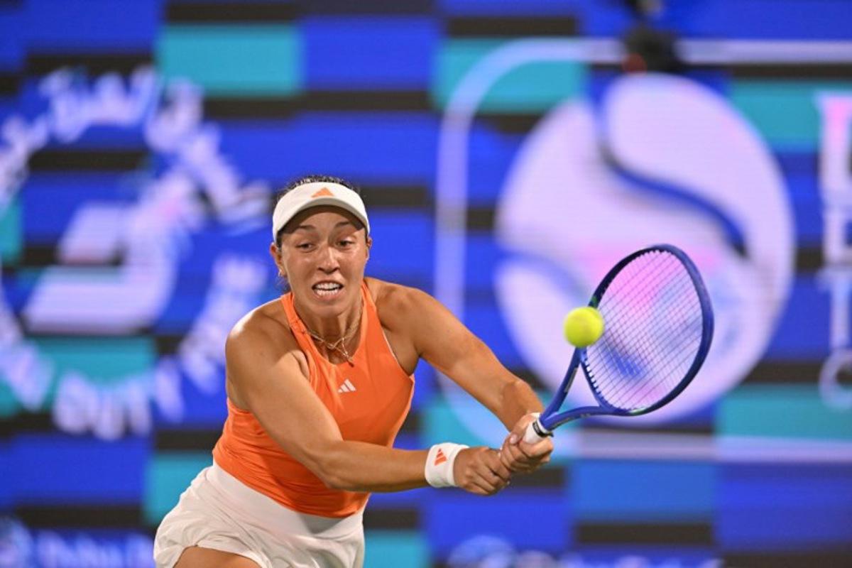 US' Jessica Pegula hits a return against compatriot Amanda Anisimova during their women's singles semi-final match at the Dubai Duty Free Tennis tournament in Dubai on February 20, 2026. Ryan Lim / AFP