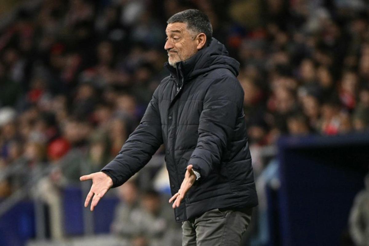 Sevilla's Spanish coach Garcia Pimienta gestures during the Spanish league football match between Club Atletico de Madrid and Sevilla FC at the Metropolitano stadium in Madrid on December 8, 2024. JAVIER SORIANO / AFP