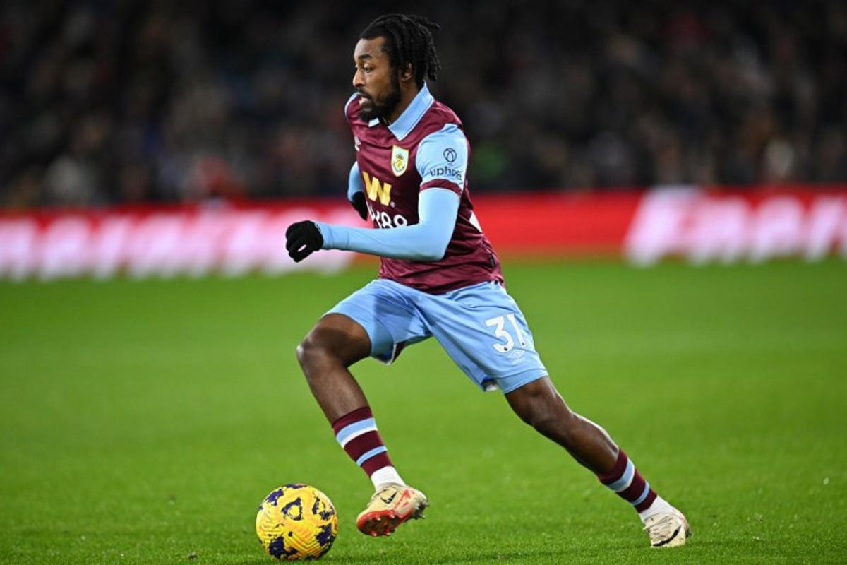 Burnley's Belgian midfielder #31 Mike Tresor runs with the ball during the English Premier League football match between Burnley and Liverpool at Turf Moor in Burnley, north-west England on December 26, 2023. Paul ELLIS / AFP