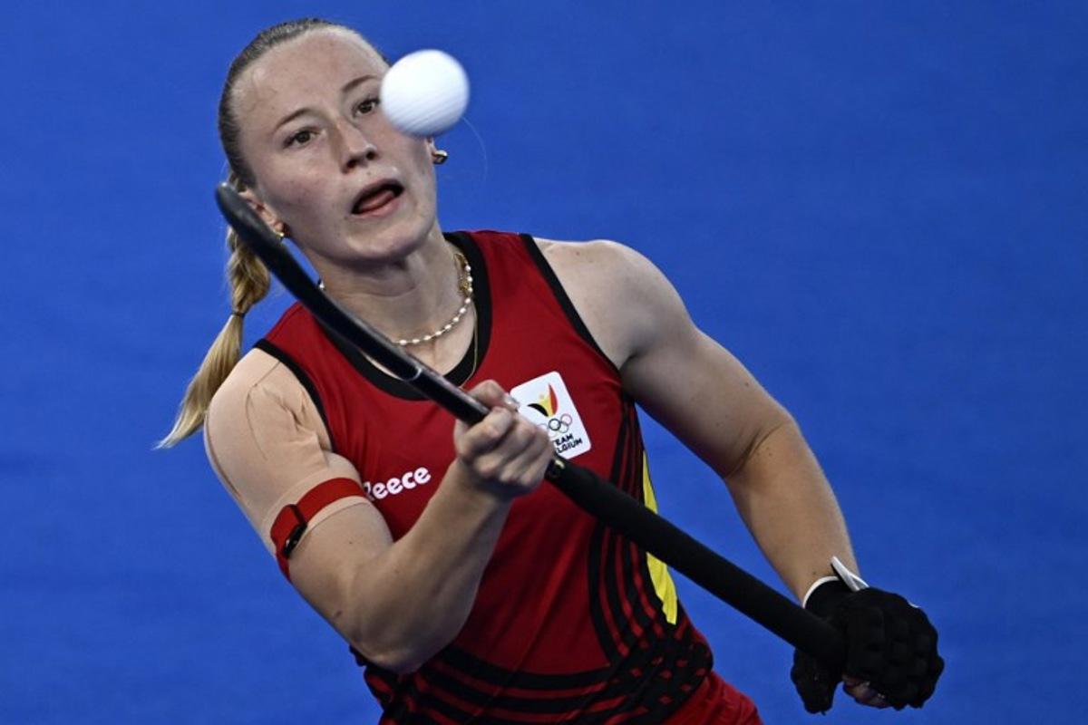Belgium's forward #06 Charlotte Englebert controls the ball in the women's pool A field hockey match between France and Belgium during the Paris 2024 Olympic Games at the Yves-du-Manoir Stadium in Colombes on July 29, 2024. JULIEN DE ROSA / AFP