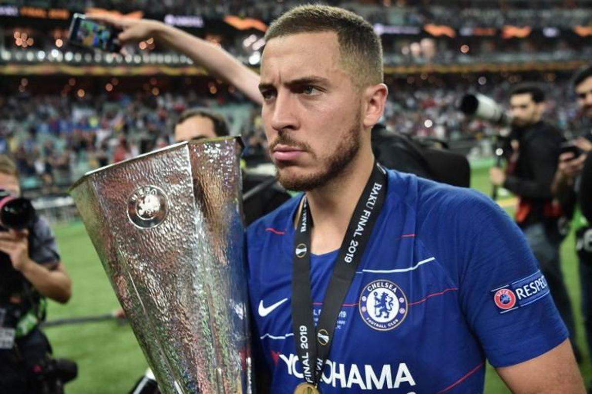Chelsea's Belgian midfielder Eden Hazard holds the trophy after winning the UEFA Europa League final football match between Chelsea FC and Arsenal FC at the Baku Olympic Stadium in Baku, Azerbaijian, on May 29, 2019. OZAN KOSE / AFP