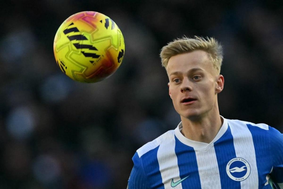 Brighton's Dutch defender #06 Jan Paul van Hecke eyes the ball during the English Premier League football match between Brighton and Hove Albion and Burnley at the American Express Community Stadium in Brighton, southern England on January 3, 2026. Glyn KIRK / AFP