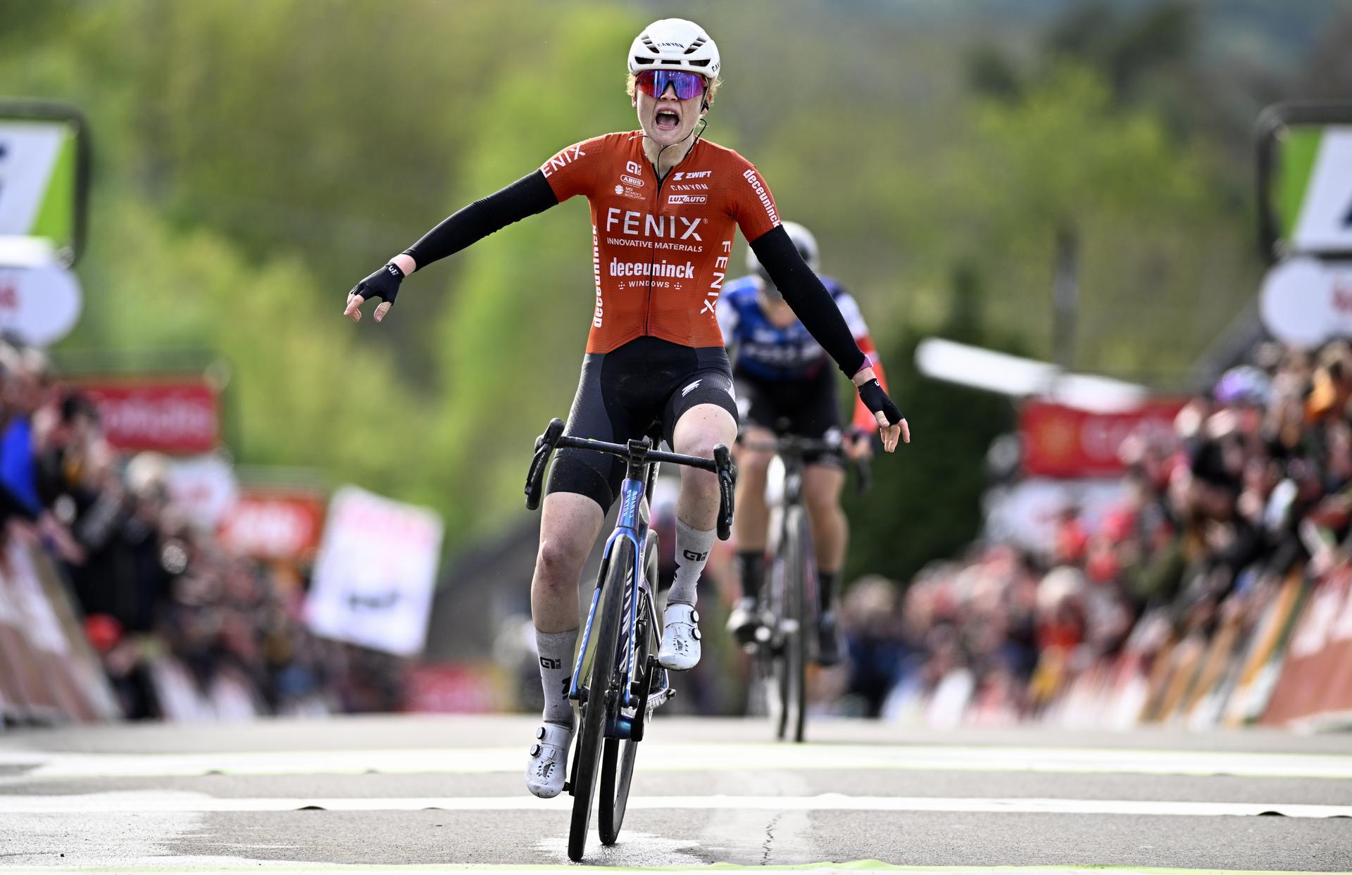 Dutch Puck Pieterse of Fenix-Deceuninck celebrates after winning the women's race of the 'La Fleche Wallonne', one day cycling race (Waalse Pijl - Walloon Arrow), 140,7 km from Ciney to Huy, Wednesday 23 April 2025. BELGA PHOTO JASPER JACOBS