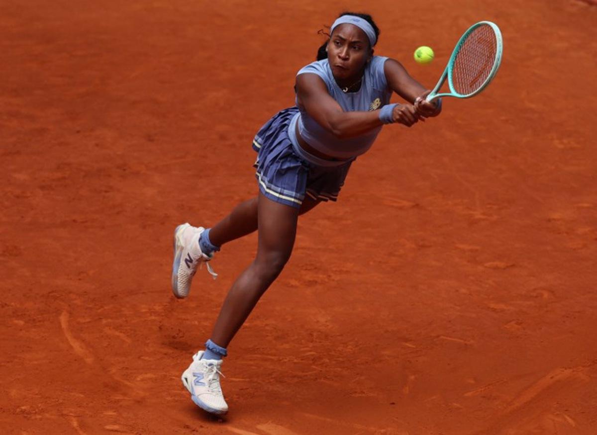 US Coco Gauff returns the ball to Russia's Mirra Andreeva during their 2025 WTA Tour Madrid Open tennis tournament quarter final singles match at the Caja Magica in Madrid, on April 30, 2025. Pierre-Philippe MARCOU / AFP