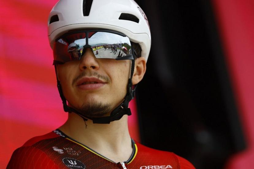 Lotto Intermarche Belgian rider Arnaud De Lie looks on during the presentation of the teams prior the 1st stage of the Giro d'Italia 2026 - Tour of Italy cycling race between Nessebar and Burgas, Bulgaria, on May 8, 2026. Luca Bettini / AFP