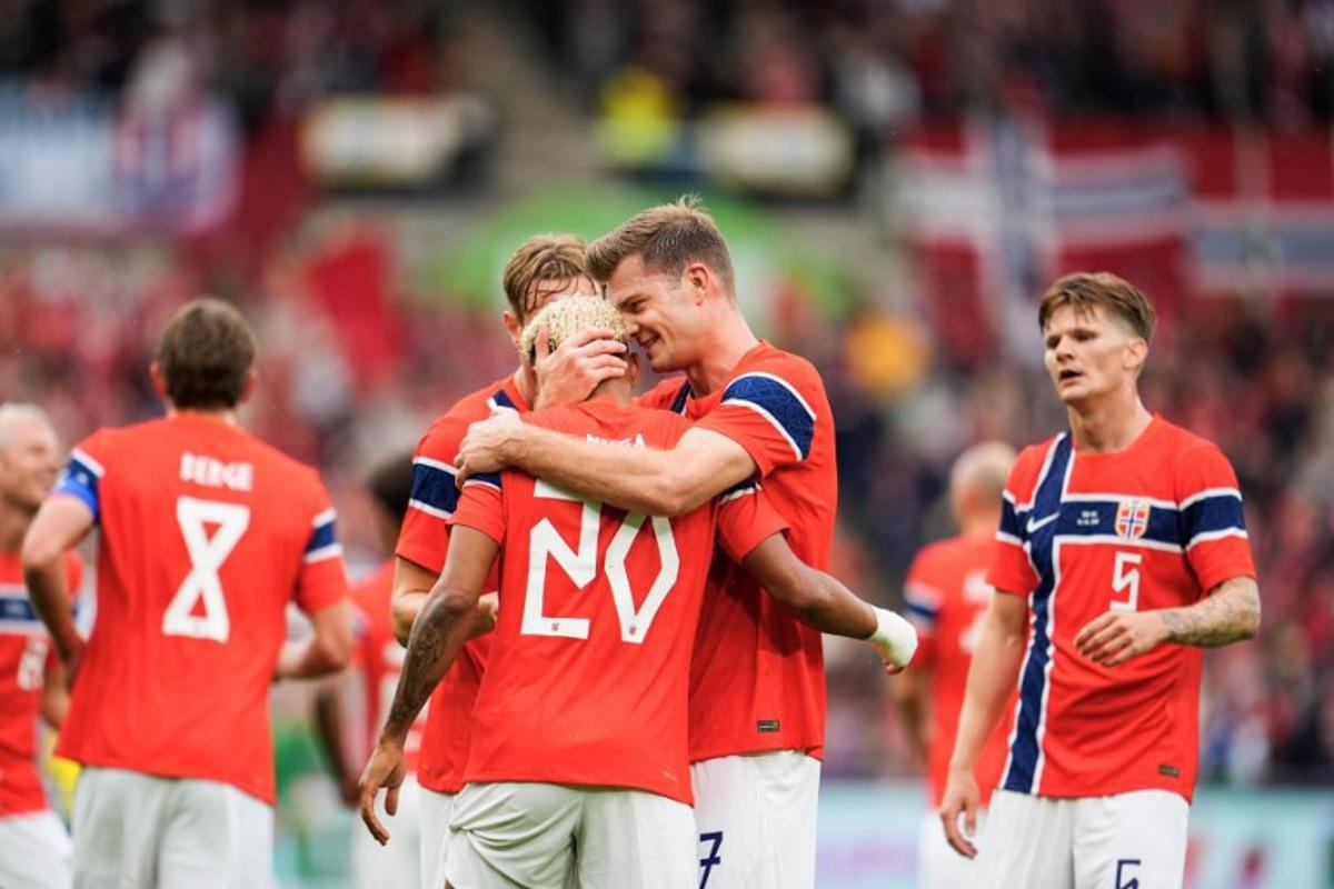 Norway's midfielder #20 Antonio Nusa (C) celebrates scoring the 2-0 goal with his teammates during the friendly match between Norway and Sweden at Ullevaal Stadium, on June 1, 2026 ahead of the 2026 FIFA World Cup football tournament. Lise Åserud / NTB / AFP