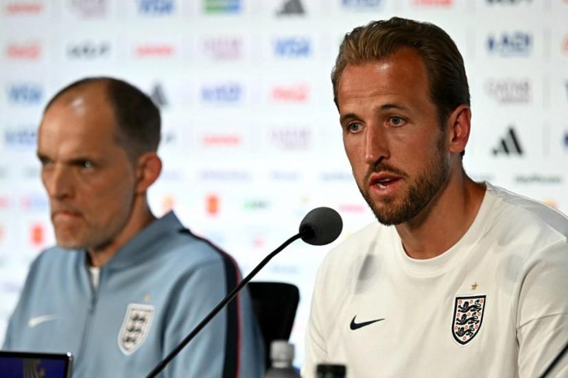 England's forward #09 Harry Kane (R) gives an MD-1 press conference next to German head coach Thomas Tuchel (L) at the Dallas Stadium in Arlington on June 16, 2026, on the eve of the 2026 World Cup Group L football match between England and Croatia. Paul ELLIS / AFP