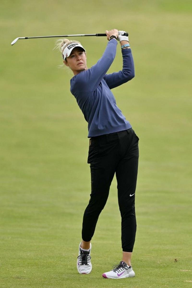 US player Nelly Korda plays her second shot on the second hole on day three of the Women's British Open Golf Championship, at Royal Porthcawl in south Wales on August 2, 2025. Glyn KIRK / AFP