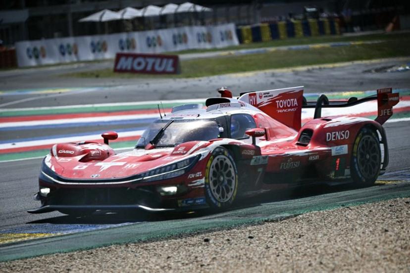 The Toyota Racing's car of British driver Mike Conway, Japanese driver Kamui Kobayashi and Dutch driver Nyck de Vriestakes a corner during the 94th edition of the 24 Hours of Le Mans at the Le Mans circuit, north-western France, on June 14, 2026. Lou BENOIST / AFP