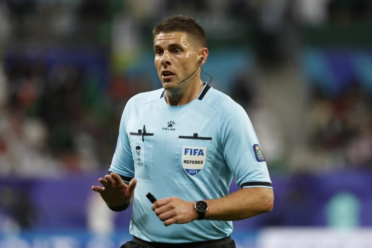 Australian referee Shaun Evans gestures during the Qatar 2023 AFC Asian Cup Group F football match between Saudi Arabia and Oman at the Khalifa International Stadium in Doha on January 16, 2024. KARIM JAAFAR / AFP
