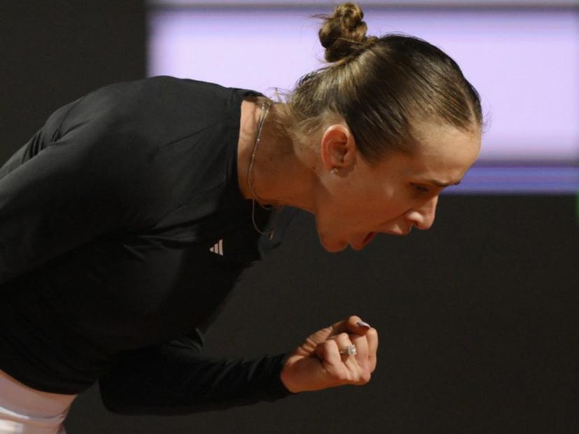 Ukraine's Elina Svitolina celebrates after scoring a point against Kazakhstan's Elena Rybakina during the ATP Rome Open tennis tournament at Foro Italico in Rome on May 13, 2026. Tiziana FABI / AFP