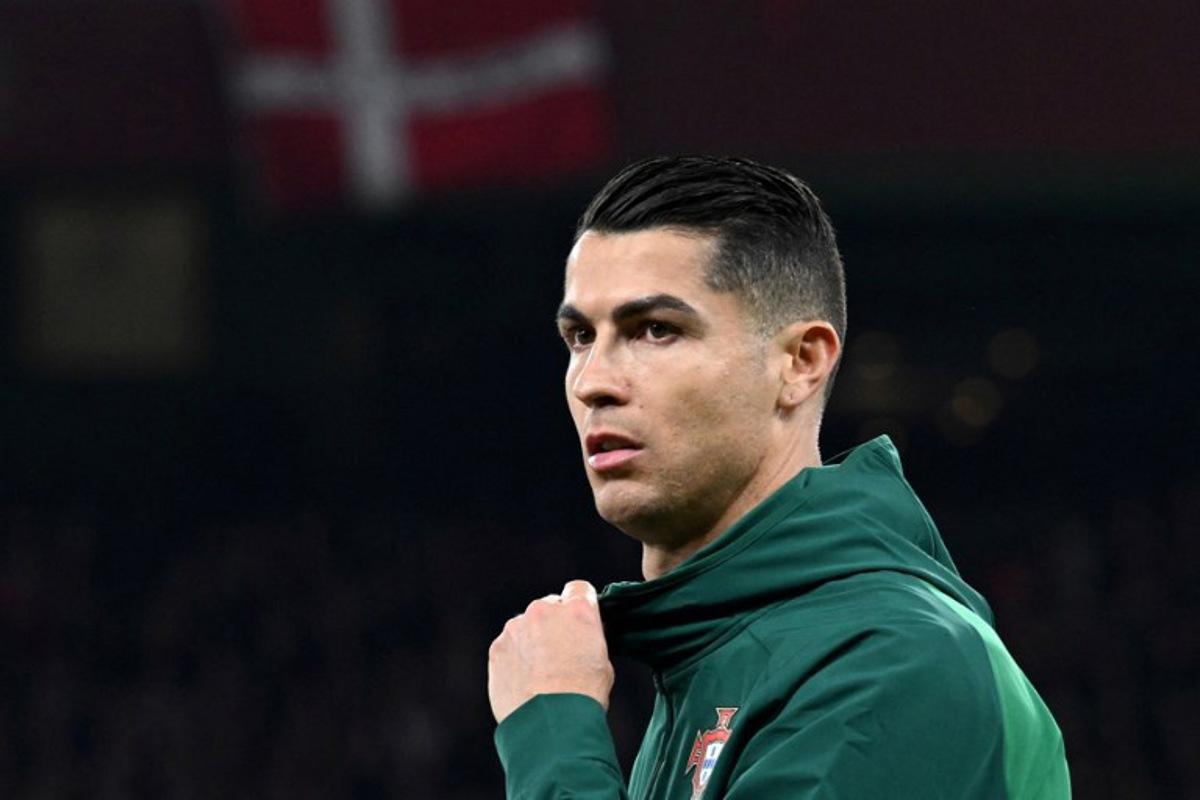 Portugal's forward #07 Cristiano Ronaldo arrives prior to the UEFA Nations League quarter-final, first-leg football match Denmark v Portugal at the Parken Stadium in Copenhagen on March 20, 2025. Jonathan NACKSTRAND / AFP