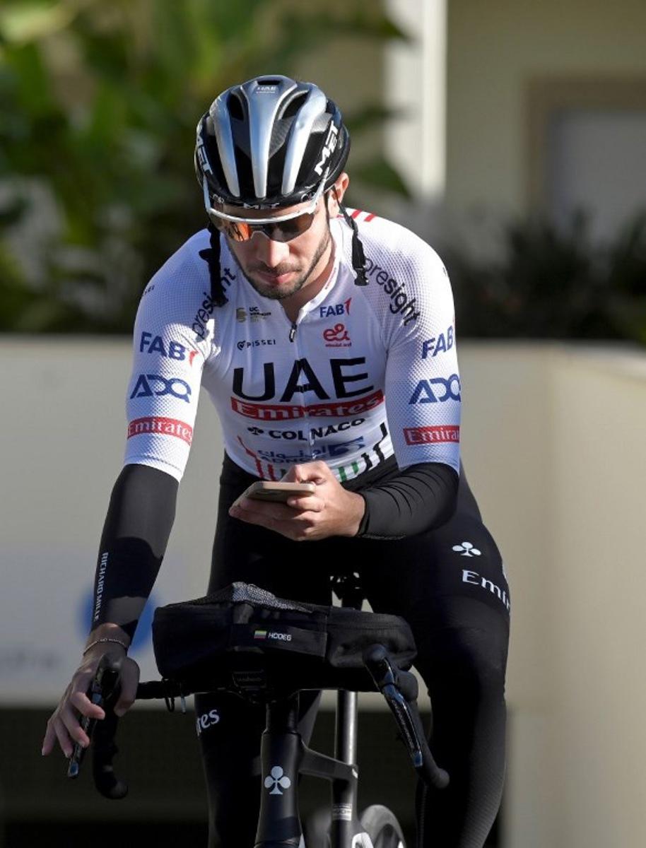 UAE-Team Emirates team member Sebastian Molano of Colombia prepares to attend a training session at La Nucia, near Alicante, eastern Spain on December 18, 2023. JOSE JORDAN / AFP